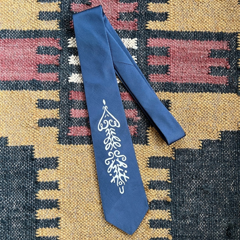 Vintage Navy Necktie with Intricate Design